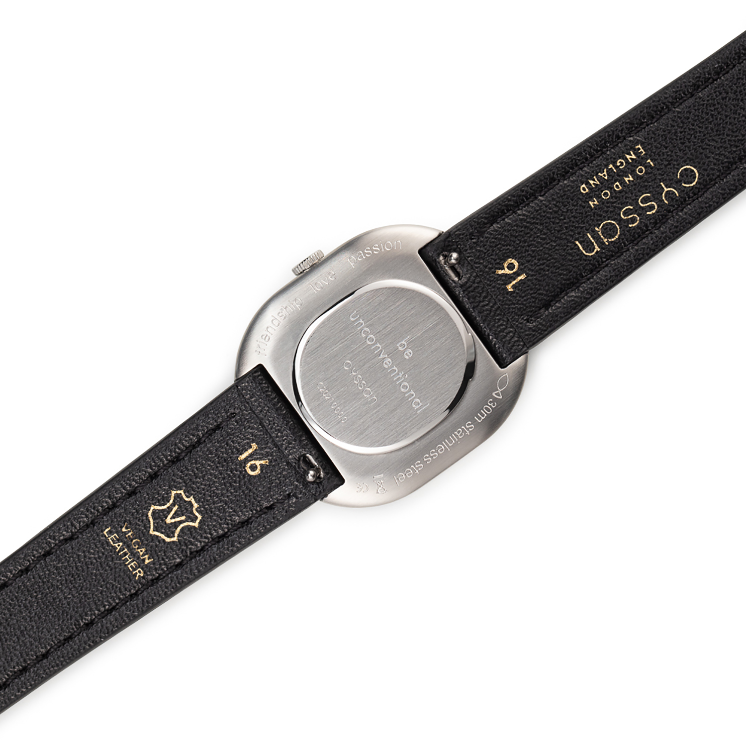 engraved watch case with teh words be unconventional and a black vegan leather strap